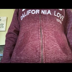 Super cute zip up sweater.